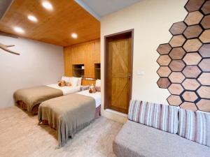 Postel nebo postele na pokoji v ubytování 日月潭五船民宿 5Boat B&B