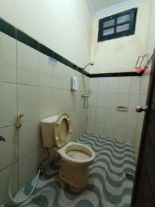 Koupelna v ubytování Rumah Kami Guest House
