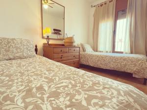 Postel nebo postele na pokoji v ubytování Villa Mas Blau Munt