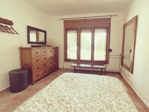 Postel nebo postele na pokoji v ubytování Villa Mas Blau Munt