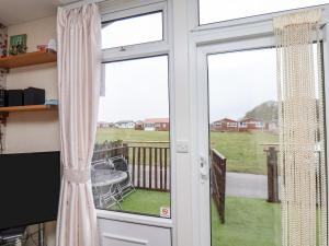 Et tv og/eller underholdning på 225 Seaside Retreat