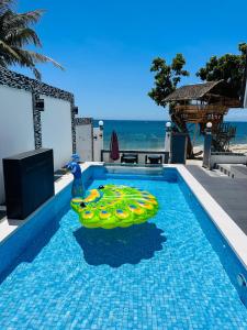 Bazén v ubytování D' Beach Resort nebo v jeho okolí