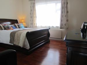 Postel nebo postele na pokoji v ubytování Edencrest B&B