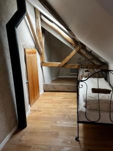Posteľ alebo postele v izbe v ubytovaní Gîte des 3 Marchands + 13 fotografií