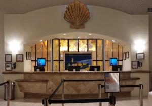a lobby with a large window in a building at Peñasco del Sol Hotel in Puerto Peñasco +60 photos