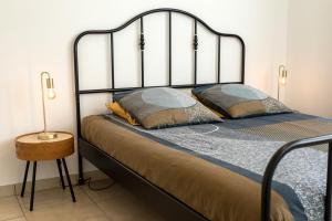 Llit o llits en una habitació de Le Brivetain ✩ Hypercentre ✩ Parking gratuit