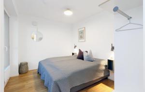 Katil atau katil-katil dalam bilik di Nice Apartment In Lembruchdümmer See +22 gambar