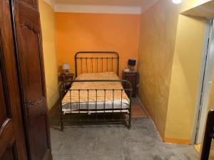 Posteľ alebo postele v izbe v ubytovaní Logement atypique tout en pierre + 4 fotografie