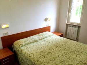 Кровать или кровати в номере Residence Palm Garden