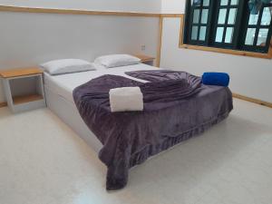 Postel nebo postele na pokoji v ubytování Ocean Beach Guraidhoo
