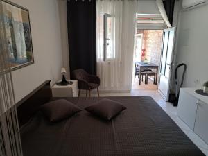 מיטה או מיטות בחדר ב-Apartmani Beba