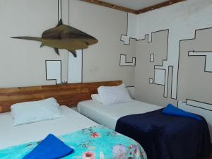 Voodi või voodid majutusasutuse Ocean Way Guraidhoo toas