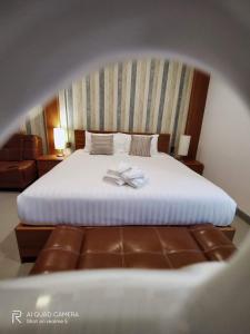 Postel nebo postele na pokoji v ubytování Bluehouse Kohyaonoi