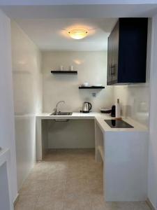 Nhà bếp/bếp nhỏ tại The F Suites