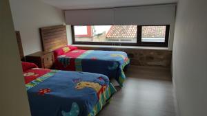 Posteľ alebo postele v izbe v ubytovaní Casa de Canteiro Louro - Muros
