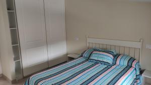 Posteľ alebo postele v izbe v ubytovaní Casa de Canteiro Louro - Muros
