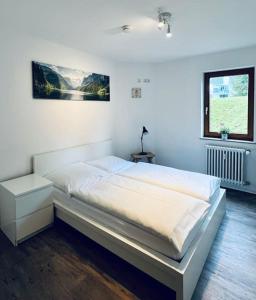 Posteľ alebo postele v izbe v ubytovaní Waldblick Titisee (W2) + Hochschwarzwald Card