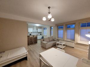 Posteľ alebo postele v izbe v ubytovaní Apartament na Wąskiej + 8 fotografií