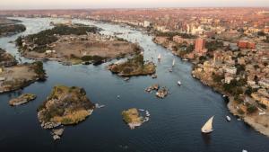 an aerial view of a river with boats at Go Inn Backpackers in Aswan