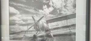 a small airplane sitting on top of a runway at Appartement de vacances - Splendide vue sur mer, Parking privé in Le Barcarès