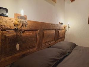 Posteľ alebo postele v izbe v ubytovaní La "Casetta" CIR 0039