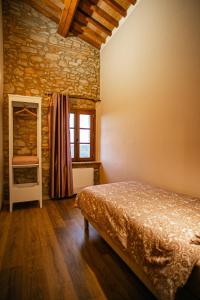 Posteľ alebo postele v izbe v ubytovaní Agriturismo Fonte Belvedere