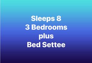 a blue sign that says sleep bedrooms plus bed suite at Romantic luxury Cottage right next to the ocean in Saint Abbs