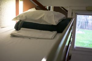 Un ou plusieurs lits dans un hébergement de l'établissement Lemon Hotel - Rouen