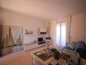 TV a/nebo společenská místnost v ubytování BellaSirmione Holiday Apartments