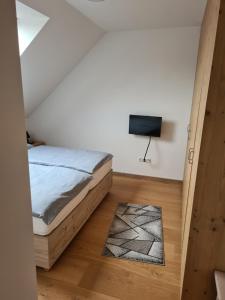 Postel nebo postele na pokoji v ubytování Stadtloft
