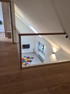 TV a/nebo společenská místnost v ubytování Stadtloft