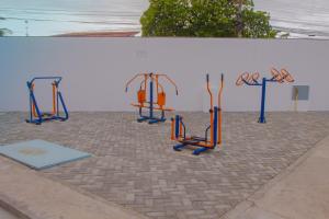 The fitness centre and/or fitness facilities at Apartamento Confortável!