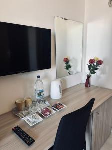 Телевізор і / або розважальний центр в Seaside Accomodation