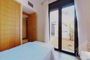 Postel nebo postele na pokoji v ubytování Precioso apartamento en Macenas
