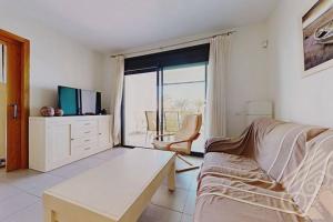 TV a/nebo společenská místnost v ubytování Precioso apartamento en Macenas