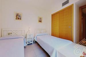 Postel nebo postele na pokoji v ubytování Precioso apartamento en Macenas