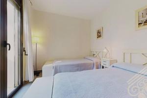 Postel nebo postele na pokoji v ubytování Precioso apartamento en Macenas
