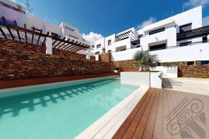 Bazén v ubytování Precioso apartamento en Macenas nebo v jeho okolí