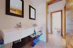 Koupelna v ubytování Precioso apartamento en Macenas
