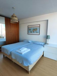 En eller flere senge i et værelse på Between River and Sea Porto Apartment