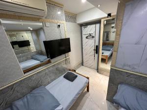 Μια τηλεόραση ή/και κέντρο ψυχαγωγίας στο T A B Hotel
