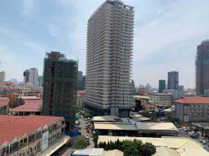 a large tall building in a city with buildings at B70 HC Rental Apartment at TK Central with Swimming Pool & Gyms in Phnom Penh