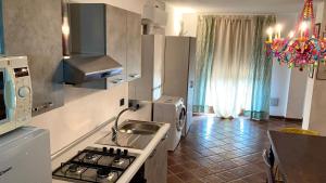 A kitchen or kitchenette at Casa Atelier