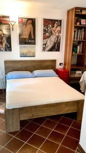 A bed or beds in a room at Casa Atelier