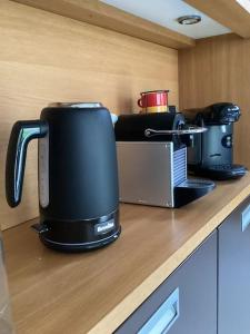 Príslušenstvo na prípravu kávy alebo čaju v ubytovaní LE GITE LACHELLE