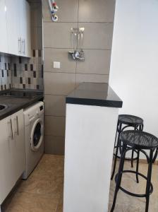 Kuchnia lub aneks kuchenny w obiekcie Rocachica Edén Beach 41