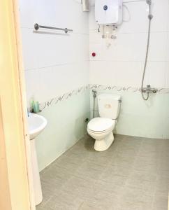 Koupelna v ubytování Nam Khánh Motel + 3 fotografie