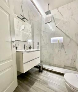 Kúpeľňa v ubytovaní Duomo Platinum Apartments + 37 fotografií