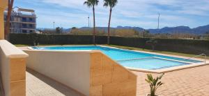 The swimming pool at or close to Xeraco Beach Alma