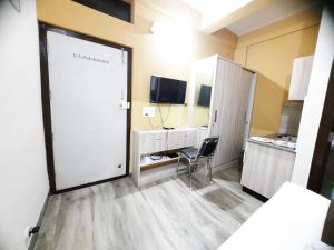 Kuchyň nebo kuchyňský kout v ubytování SM Rooms HSR Layout Bengaluru